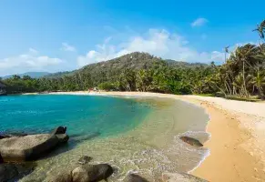 a) Relajarte en la playa o en una terraza con buena vista